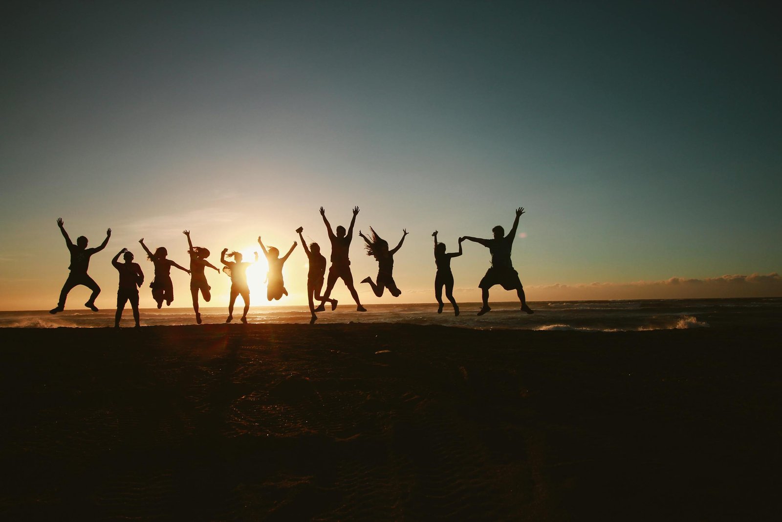 Your Journey Silhouette Photography of Group of People Jumping during Golden Time